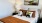 Bedroom with natural lighting and high ceilings